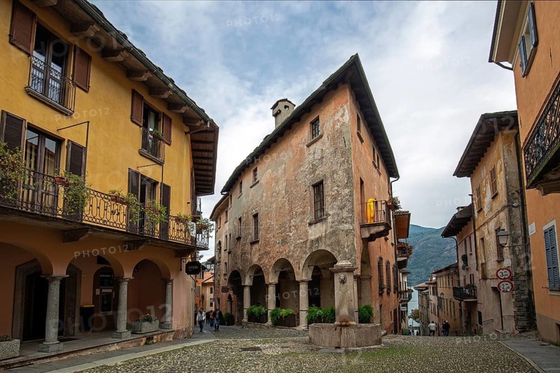 Alley with Hotel Pironi in the historic centre of Cannobio, Lake Maggiore, province of Verbano-Cusio-Ossola, Piedmont region, Italy