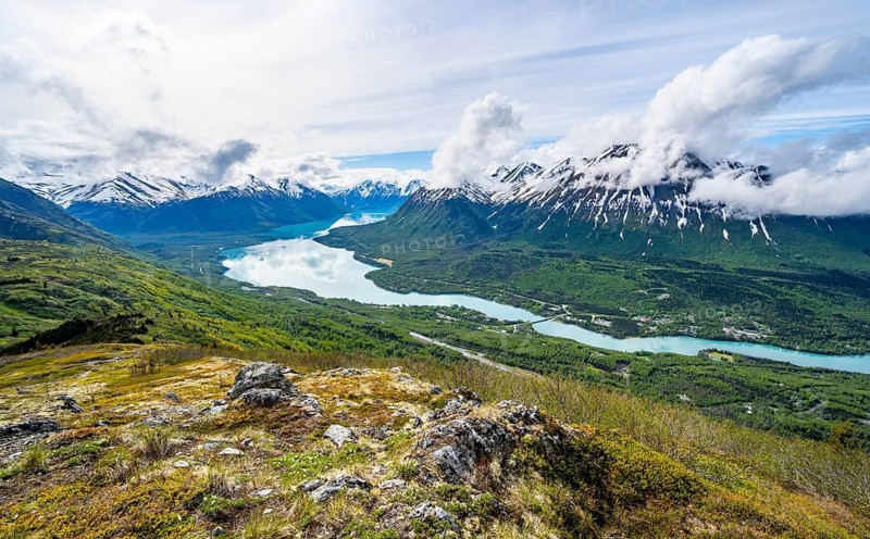 View of snowy mountains and turquoise lake Kenai Lake, Slaughter Ridge Trail, Cooper Landing, Kenai Peninsula, Alaska, USA