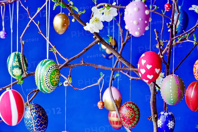 Easter, Easter bouquet with colorful Easter eggs, branches with flowers of an ornamental quince, spring, Germany