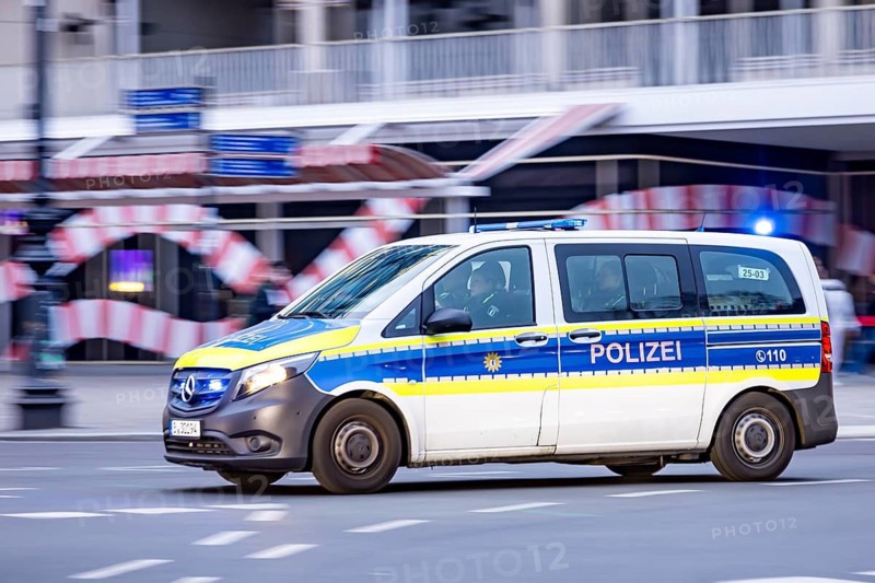 City view of Berlin. Police mission with flashing lights. Berlin, Germany