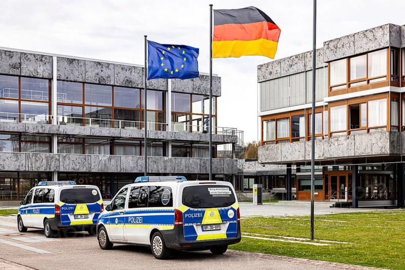 Federal Constitutional Court Karlsruhe, (BVerfG) . Exterior view with the flags of Europe and the Federal Republic of Germany. Police vehicles. Karlsruhe, Baden-Württemberg, Germany