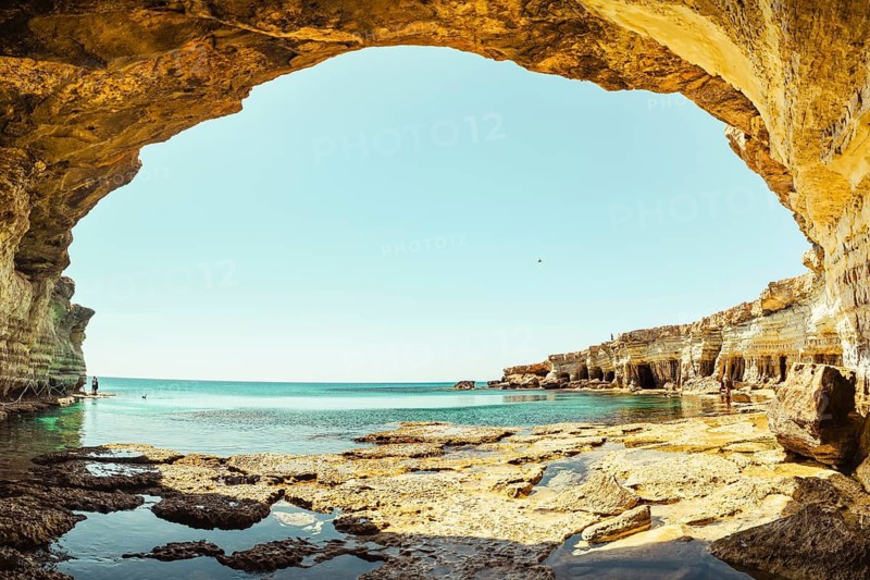 Sea cave arch viewpoint near Cape Greko, Capo Greco, Ayia Napa and Protaras on Cyprus island, Mediterranean Sea. Breathtaking seascape. Turquoise crystal clear waters in sunny day