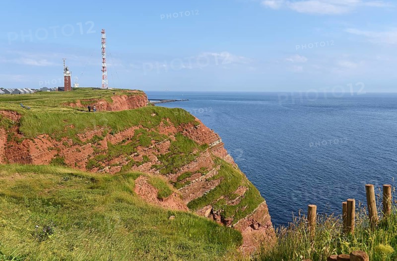 Lighthouse and radio mast on the offshore island of Heligoland, Schleswig-Holstein, Germany