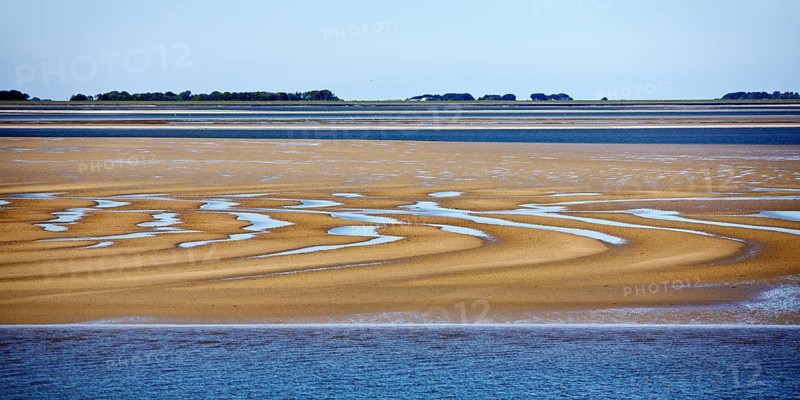 Schleswig-Holstein Wadden Sea National Park at low tide with sandbanks and mainland, North Frisia, Germany