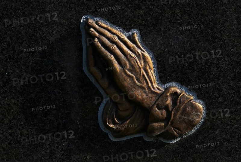 Depiction of praying hands, hands folded in prayer, ornament, relief, on tombstone, Christian symbol of faith, hope, humility, cemetery of Dionysius Church, Schmiden near Fellbach, Baden-Württemberg, Germany