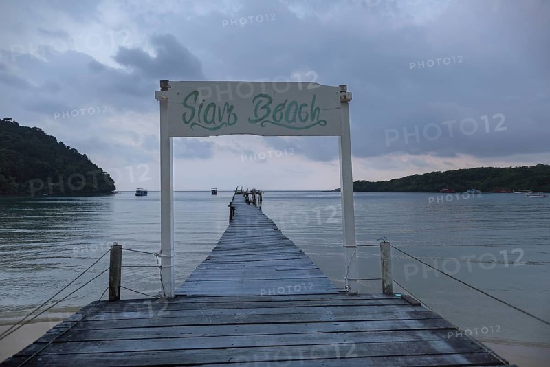 Jetty on Siam Beach in front of sunrise, Ko Kut or Koh Kood, Gulf of Thailand, Thailand