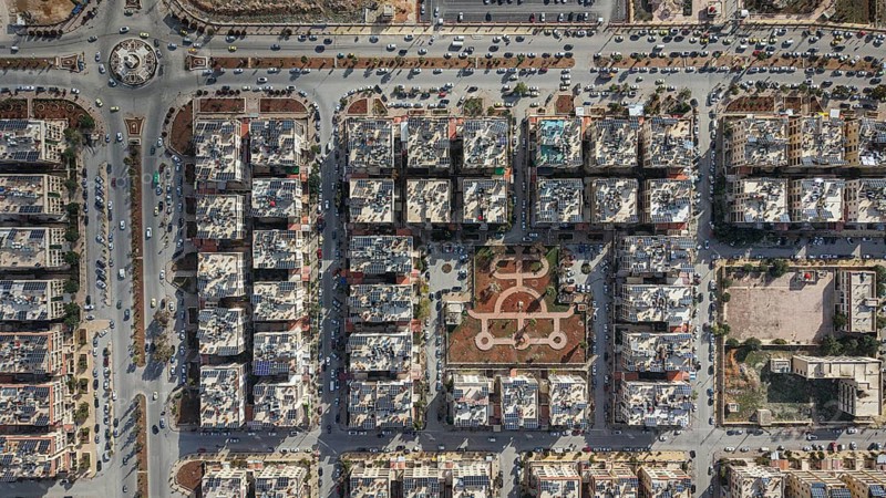 In Aleppo, Syria on February 10, 2026, a breathtaking top-down aerial drone shot captures the urban grid and organized streets of the city, Aleppo, Aleppo, Syria