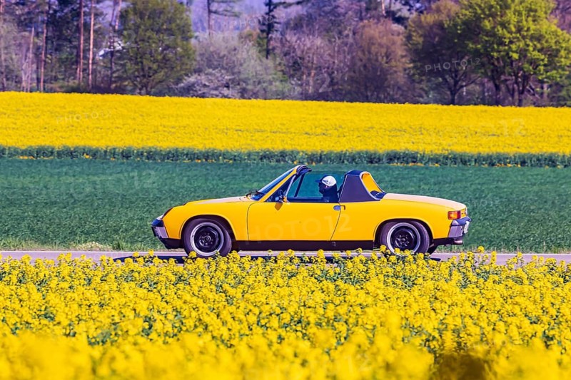Travelling on a country road in the Swabian Alb with a VW Porsche 914 Youngtimer convertible, Erkenbrechtsweiler, Baden-Württemberg, Germany