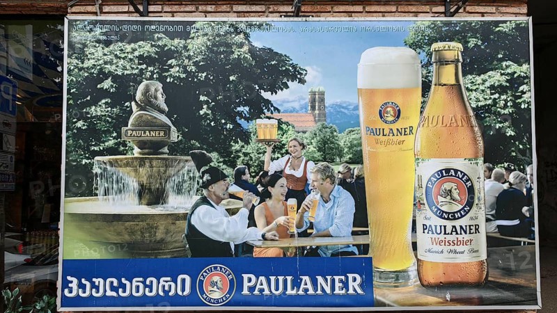 Advertisement for Paulaner Bier in Georgian script on an advertising poster, Georgia