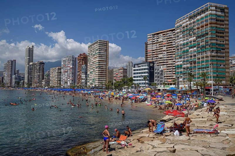Many tourists on the beach in front of skyscrapers, Playa Levante, Benidorm, Alicante province, Costa Blanca, Spain