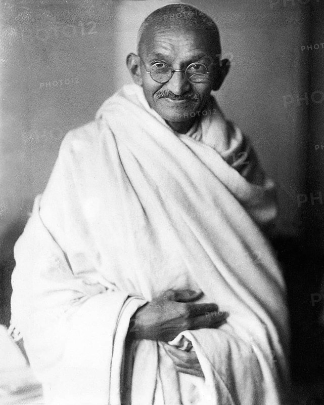 Mahatma Gandhi (born 1 October 1869 - assassinated 30 January 1948) was an Indian pacifist, politician, important resistance fighter, lawyer and publicist. Portrait 1931, London He gained his first formative experiences with the cruelty of colonialism and resistance during his time in South Africa (1892-1914) . After returning to India, he successfully led the Indian independence movement against the British colonial power. India finally achieved independence in August 1947. About six months later, he was assassinated by a Hindu nationalist. He is regarded as an outstanding representative of the struggle for freedom against oppression, colonialism, racism and injustice. The methods of non-violent resistance he developed have been a model for many social movements ever since. Contemporary history, historical