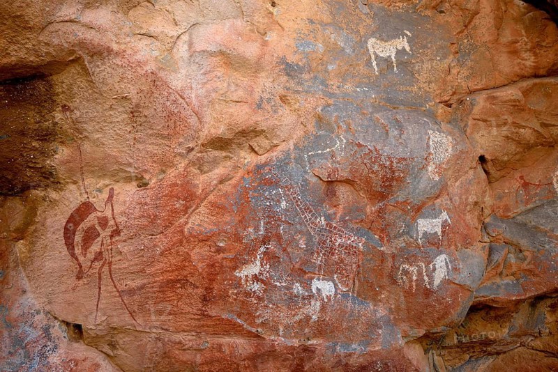 Rock paintings in the De Riet cave, left a bouquet, near De Riet, Kunene region, Namibia