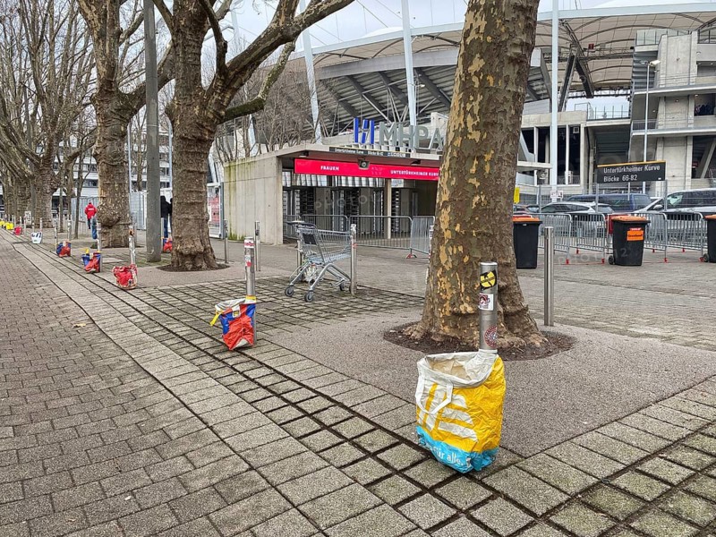 Shopping trolleys, carrier bags, bags for deposit bottles, can deposit, bottle deposit, deposit bottle collectors in front of MHPArena, MHP Arena, in front of a Bundesliga football match, Stuttgart, Baden-Württemberg, Germany
