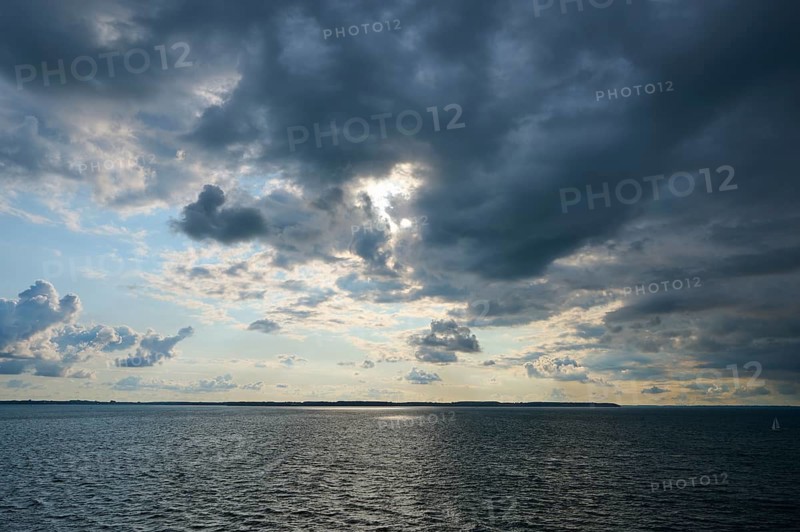 Dramatically cloudy sky over the Baltic Sea, broken by rays of sunshine, autumn, Kiel, Schleswig-Holstein, Germany