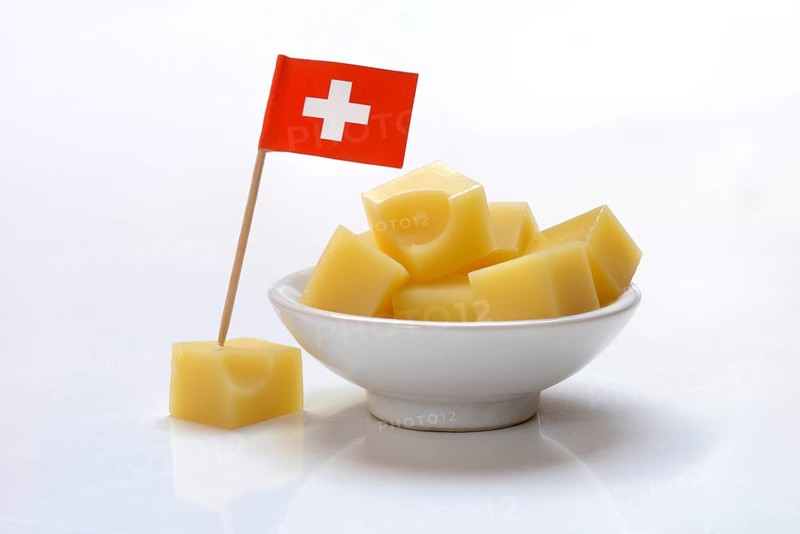 Emmental cheese in cubes with Swiss flag, Switzerland