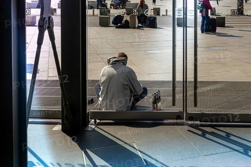 Everyday scenes, travelers and railway employees as well as the interior design, signs, signposts and the DB travel center, in and at Berlin Central Station, Germany