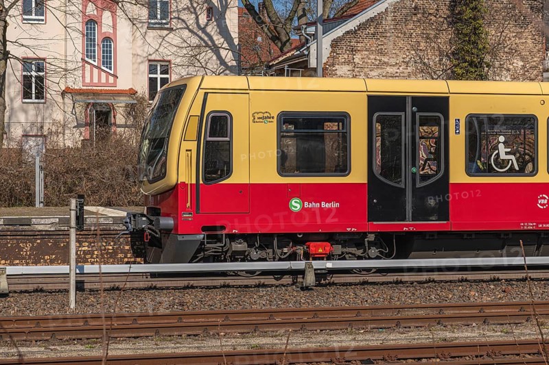Berlin S-Bahn train in front of the entrance to Lichterfelde West station, Berlin, Germany