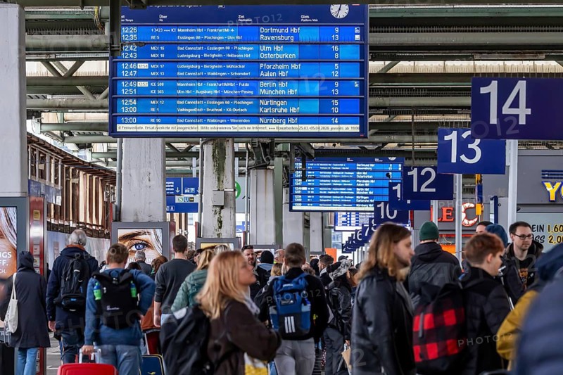 Travelers in Central Station, Passengers and Departure Board at Stuttgart Central Station, Baden-Württemberg, Germany