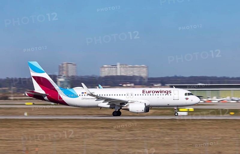 Stuttgart Airport STR EDDS with airplane taking off. Registration: D-AEWS, Eurowings, Airbus A320-200. Stuttgart, Baden-Württemberg, Germany