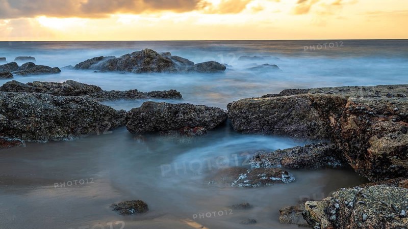 Sunrise on the beach, coast near Sadah, Oman