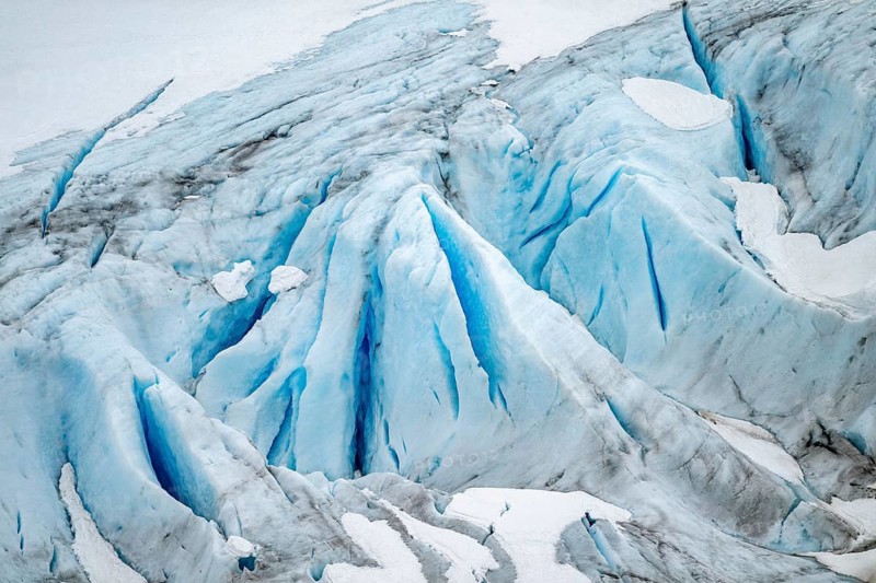 Blue rugged glacier ice with crevasses and snow, detail, Exit Glacier, Kenai Peninsula, Alaska, USA