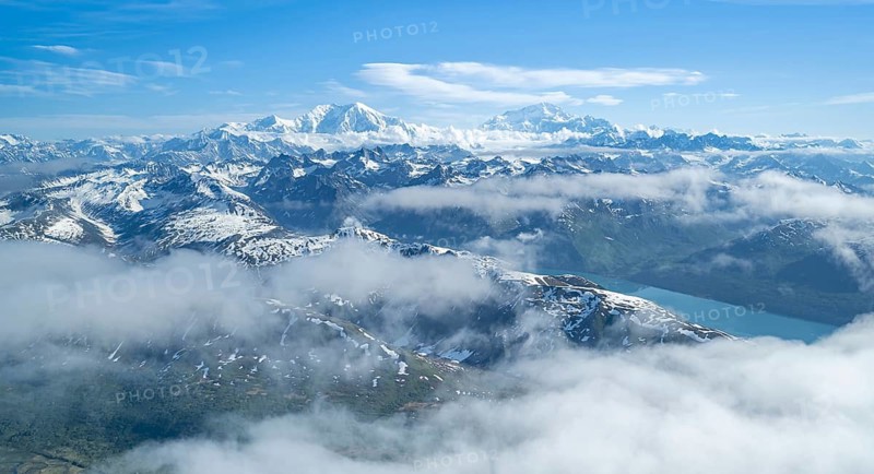 Clouds over high mountains, Mt Foraker and Mt Denali or Mount McKinley, aerial view, Alaska Range, Denali National Park, Alaska, USA