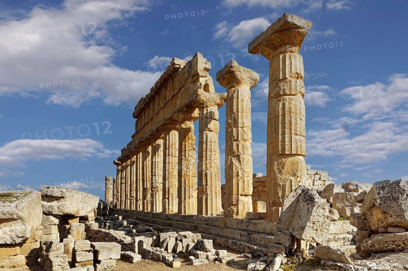 Dorian Peripteros Temple C, 550 BC, presumably dedicated to Apollo, partly rebuilt in 1925, Acropolis by Selinus, archaeological sites of Selinunte, Parco Archeologico di Selinunte, Castelvetrano, Trapani community consortium, Sicily, Italy, Mediterranean