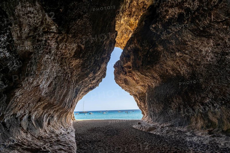 Rock cave on the beach at Cala Luna, Golfo di Orosei, Baunei, Sardinia, Italy