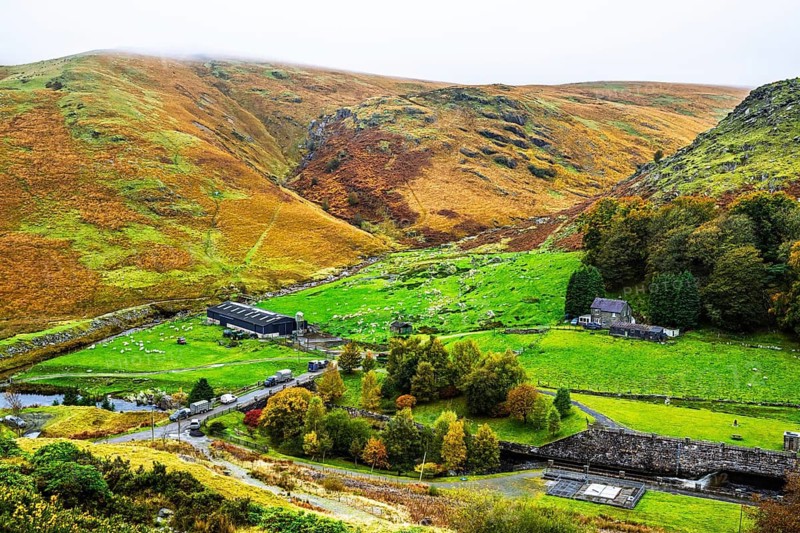 Autumn colors over Claerwen Dam, Claerwen Valley, Elan Valley Reservoir, Rhayader, Powys, Wales, UK