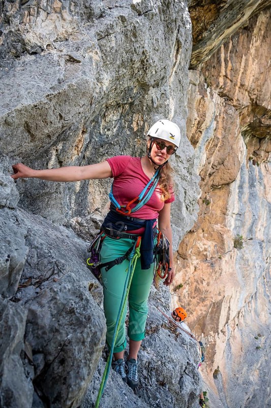 Climber on the rope, multi-pitch climbing, Via la Bellezza della Venere climbing tour, Garda Mountains, Arco, Trentino-Alto Adige, Italy