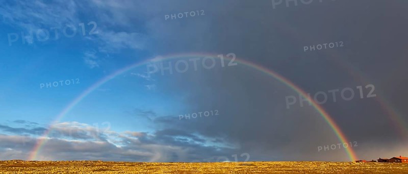 A complete beautiful rainbow in front of a stormy sky, Landscape, Finland, Varanger, Finnmark, Norway