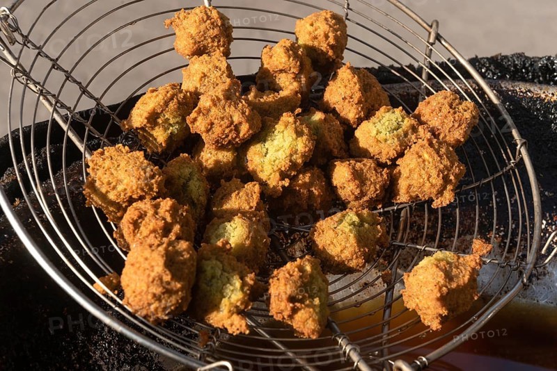Egyptian falafel known locally as Ta'ameya and the most popular street food in Egypt and the Middle East, made from dried fava beans instead of chickpeas and eaten with pitta bread and tahini sauce