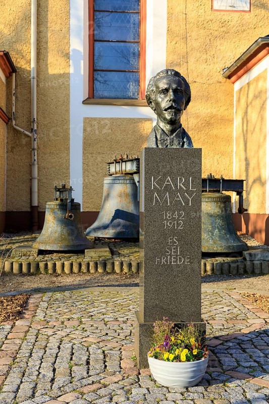 Bust of Karl May with biographical data and inscription Es sei Friede, in front of the Trinitatis Church on the Neumarkt in Ernstthal, Hohenstein-Ernstthal, Saxony, Germany