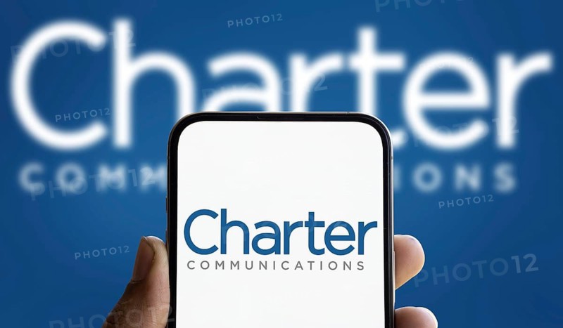 Dhaka, Bangladesh- 5 Dec 2024: Charter communications logo is displayed on smartphone.Charter Communications Inc is an American telecommunications and mass media company.