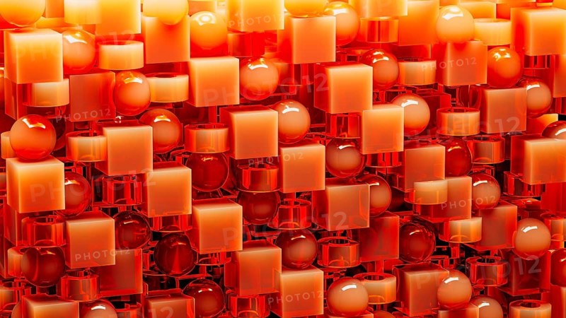 An engaging array of 3D geometric shapes in fiery orange tones combines spheres and cubes, creating a dynamic and visually stimulating design