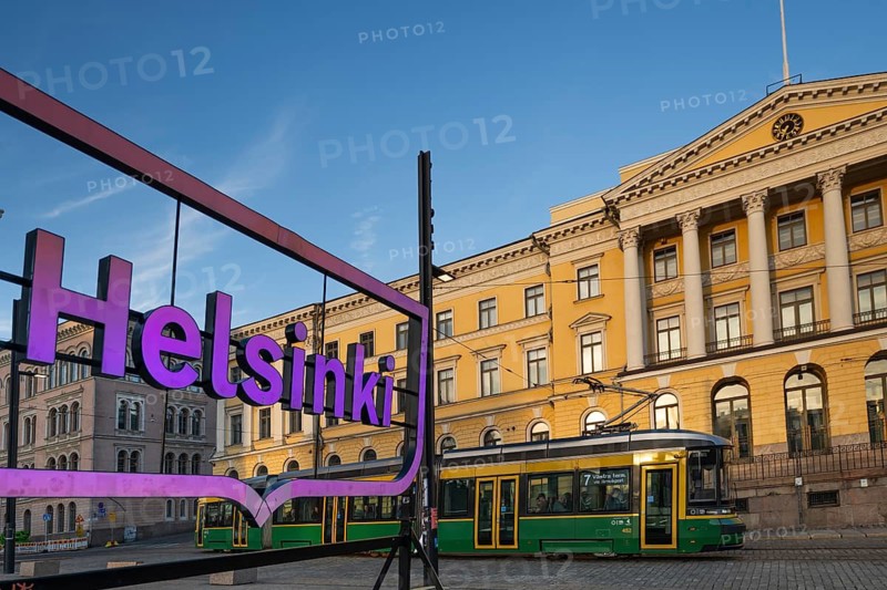 Large pink glowing city logo of Helsinki, Snellmaninkatu, city center, state government office, Ministry of Finance, Helsinki, Finland