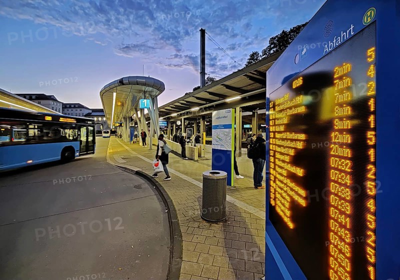 Bus station in the early morning right next to Wuppertal main station, public transport connection, North Rhine-Westphalia, Germany