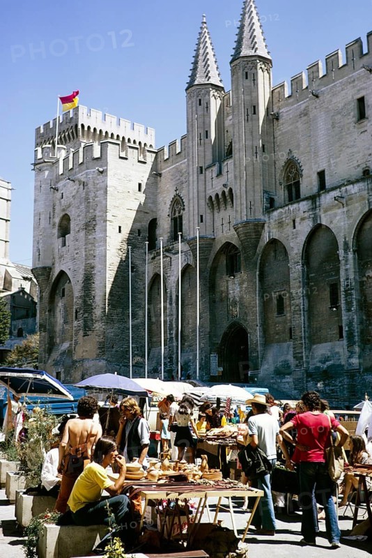 People at the arts and crafts market in front of the Palais des Papes, Avignon, France 1972
