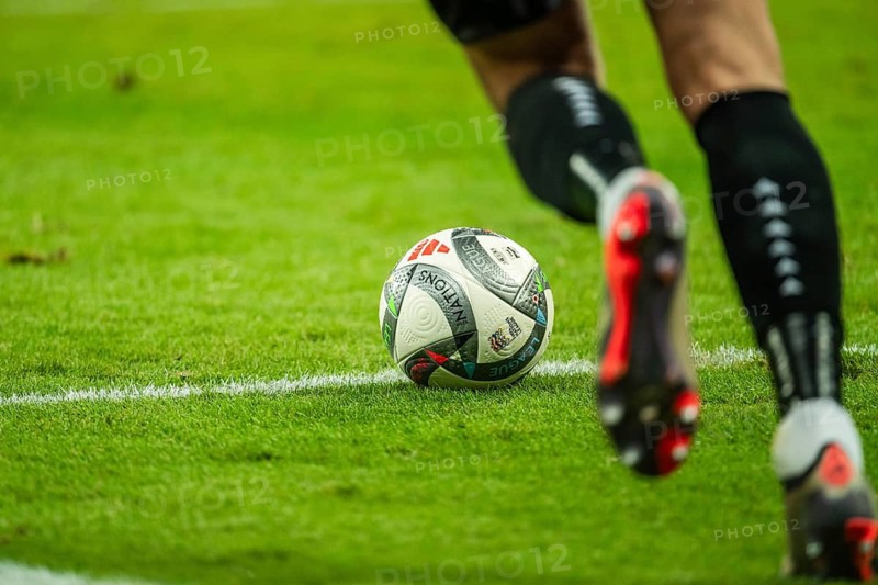 WROCLAW, POLAND - OCTOBER 14, 2024: UEFA Nations League match Ukraine - Czechia. Detail of the ball and player's legs.