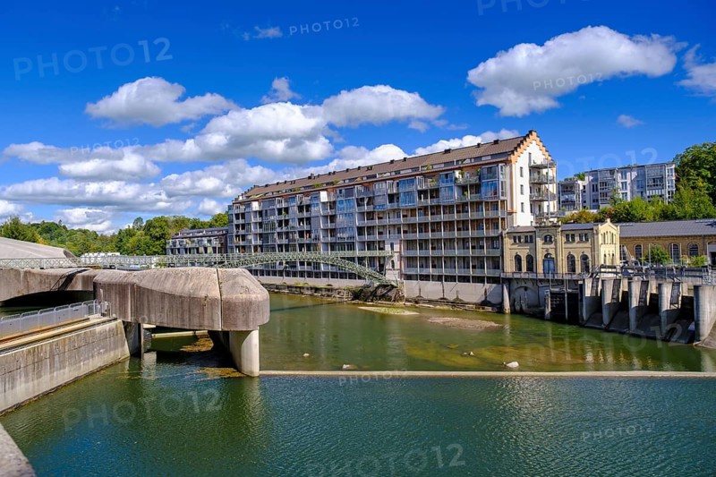 Old renovated spinning mill and dam, hydroelectric power plant on the Iller, Kempten, Oberallgäu, Swabia, Bavaria, Germany