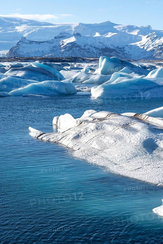 Blue landscape detail with floating icebergs in Jokulsarlon glacier lagoon in Iceland