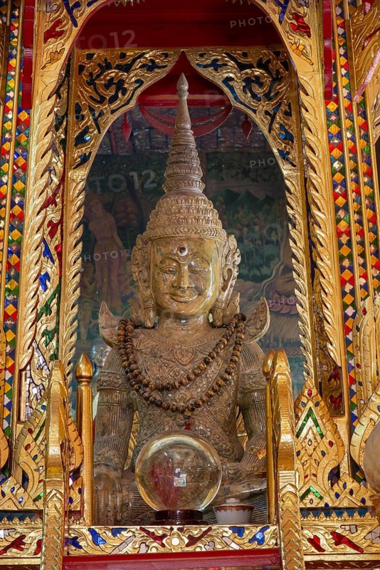 Replica of the Pha Kaeo (Emerald Buddha) in the large entrance hall, Wat Si Muang temple complex, Vientiane, Laos