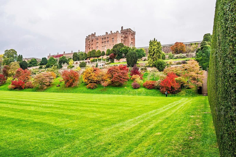 Autumn colors over Powis Castle and Garden, Welshpool, Powys, Wales, UK