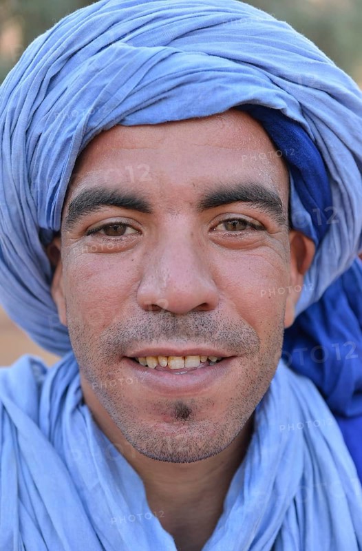 Berber with light blue turban, Merzouga, Meknès-Tafilalet region, Morocco