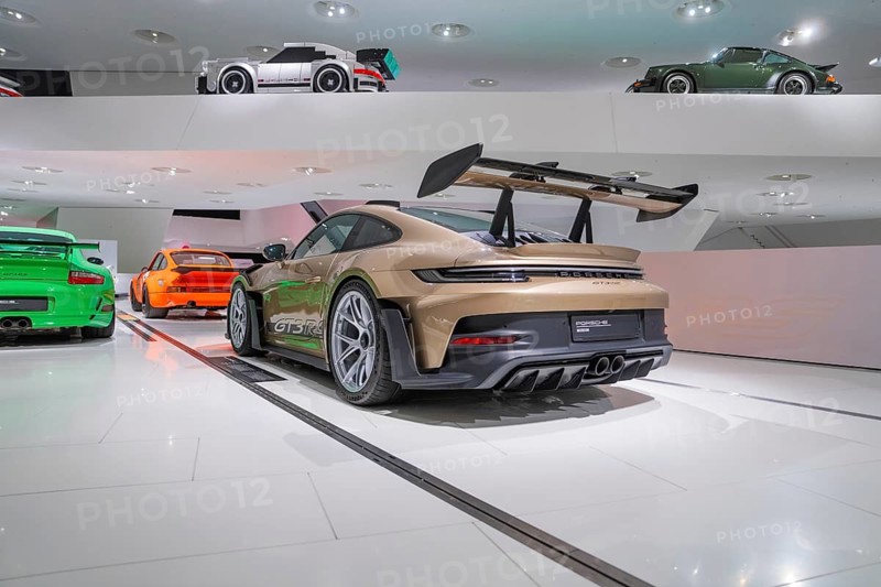 Sports car with wing spoiler in a modern exhibition with various colors, Porsche Museum, Stuttgart, Germany