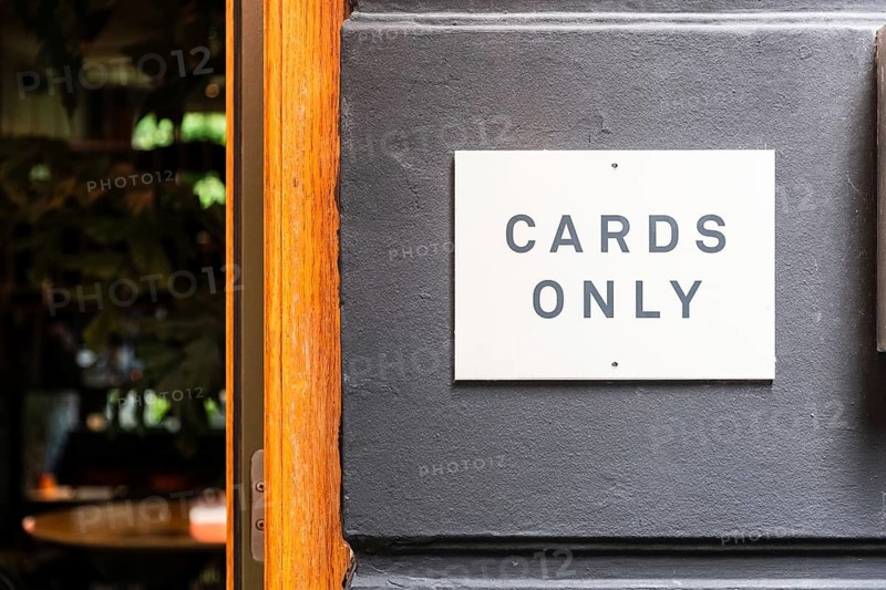 Cards Only sign at the entrance of a restaurant in Utrecht, Netherlands