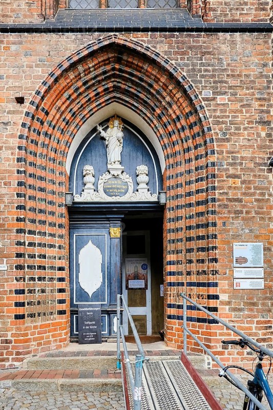 Gothic pointed arch portal, south side of the Nikolaikirche, Old Town Hanseatic City of Wismar, Mecklenburg-Western Pomerania, Germany