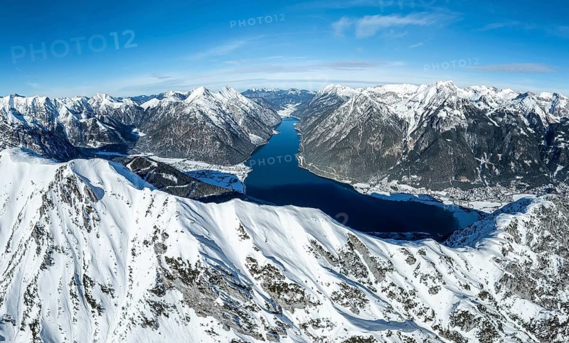 Aerial view, epic view of mountain landscape with snow in winter, summit of Bärenkopf, Achensee, Tyrol, Austria
