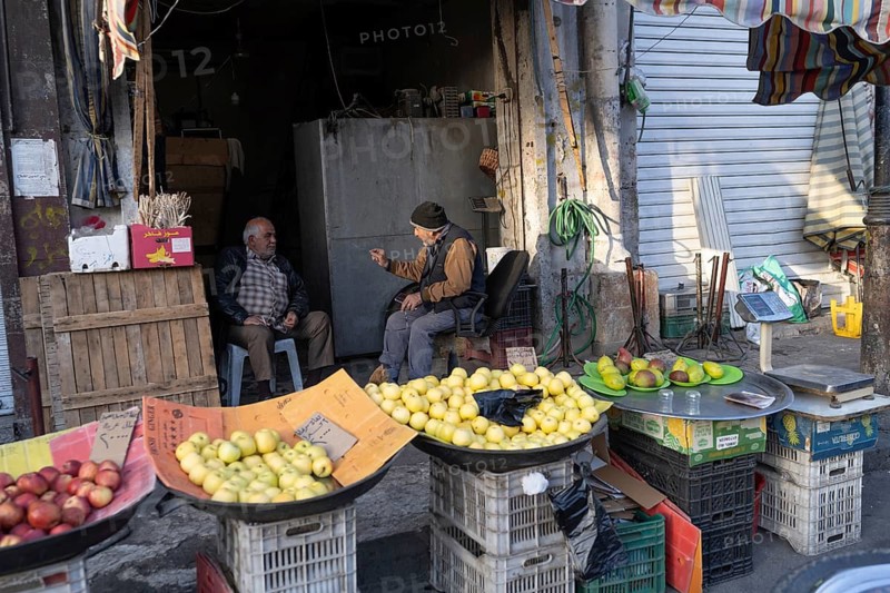 Damascus, Syria. December 5th 2025. A Syrian fruit market vendor along Malik Feisal Street near Damascus Old City in the Syrian capital, Damascus, Syria