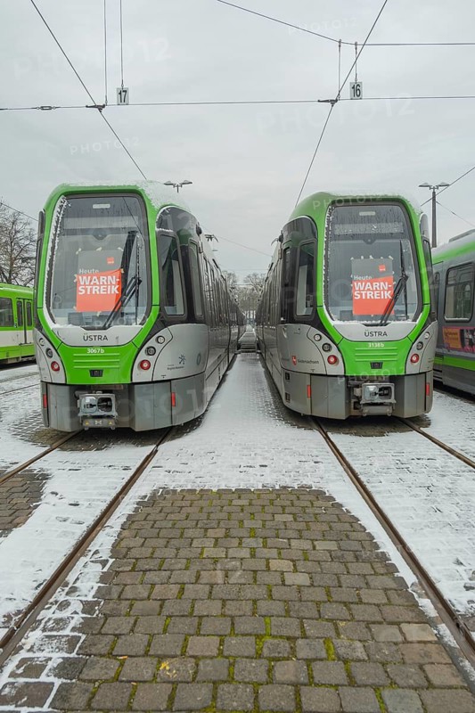 View of two TW 3000 trains of Üstra with a strike poster stuck to the windscreen, Verdi, strike, trade union, Hanover, Lower Saxony, Germany